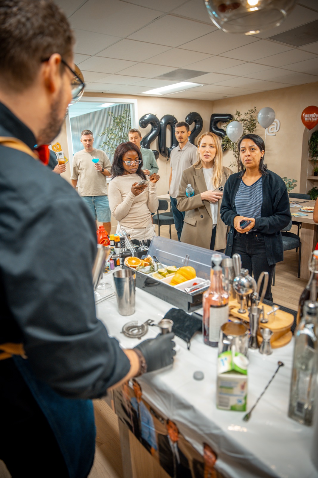 Guests chatting around the bar at a Miami corporate event