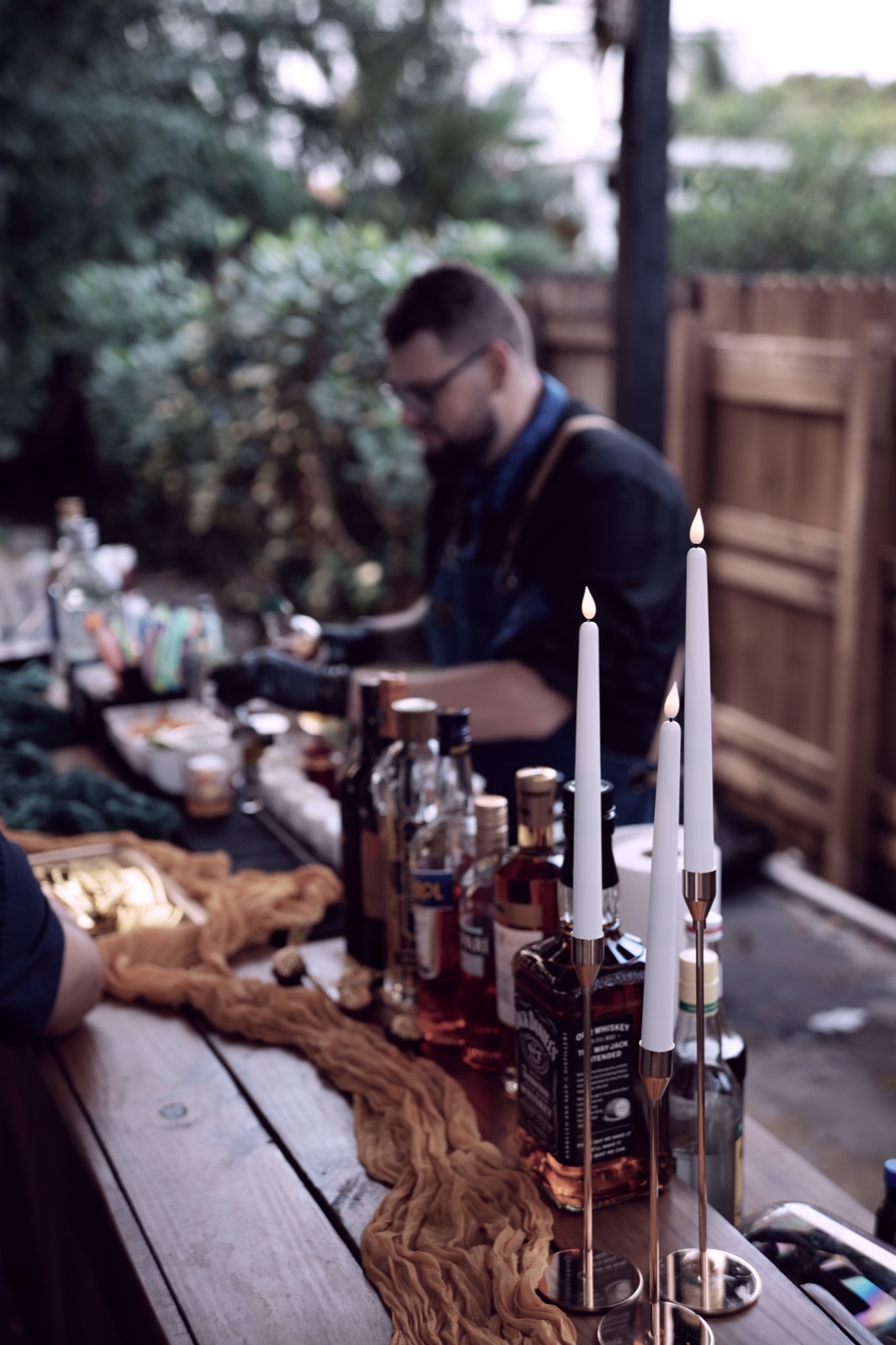 Candle-lit bar setup at a Coral Gables wedding reception